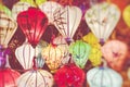 Colorful lanterns spread light on the old street of Hoi An Ancient Town. Selective focus Royalty Free Stock Photo