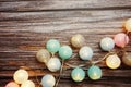 Colorful LED cotton ball decorative on wooden background Royalty Free Stock Photo