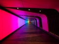 Colorful LED lights art wall tunnel underground subway underpass in Kings Cross St Pancras train station London GB UK