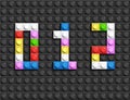 Colorful lego numbers 0,1,2 from plastic building lego bricks. Colorful vector lego numbers . Black lego background