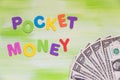 Colorful letters with dollars, pocket money