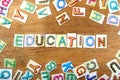 Colorful letters spelled as education