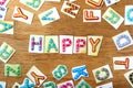 Colorful letters spelled as happy