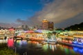 Colorful light building at night in Clarke Quay, Singapore. Clarke Quay, is a historical riverside quay in Singapore. Royalty Free Stock Photo