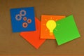 Colorful light bulbs with gears. Innovation and ideas concept