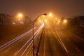 Colorful light traces of busy night traffic on highway. Royalty Free Stock Photo