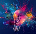 Colorful Lightbulb with Splash of Paint. Creativity and Energy Concept Royalty Free Stock Photo
