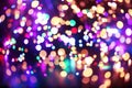 Bright and colorful lights of multiple Christmas trees background