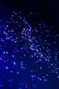 Colorful lights blurred glitter background. Abstract illuminated texture. Christmas, new year or birthday celebration. Night life Royalty Free Stock Photo