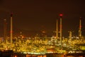 The colorful lights in oil refinery industry power station at night time with dark sky. Royalty Free Stock Photo