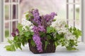 Colorful lilac blooms in the basket. Royalty Free Stock Photo