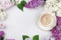 Colorful lilac flowers and coffee cup Royalty Free Stock Photo