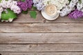 Colorful lilac flowers and coffee cup Royalty Free Stock Photo