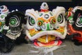 Colorful lion dance masks await the dancers to celebrate Chinese New Year