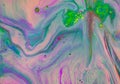Colorful liquids mixing under water close up