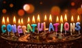 Colorful lit Congratulations candles on chocolate cake Royalty Free Stock Photo