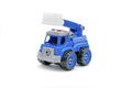 Colorful little mini blue plastic police car tower,crane machine toy isolated on white background, mockup with copy