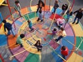 Children playing with hula hoops and jump ropes