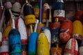 Colorful lobster buoys in New England Royalty Free Stock Photo