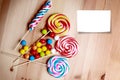 Colorful lollipops and different colored round candy. Royalty Free Stock Photo