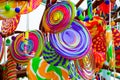 Colorful lollipops and different colored round candy. Royalty Free Stock Photo