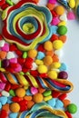 Colorful lollipops and different colored round candy Royalty Free Stock Photo