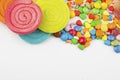 Colorful lollipops and different colored round candy Royalty Free Stock Photo