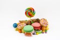 Colorful lollipops and different colored round candy. Top view Royalty Free Stock Photo