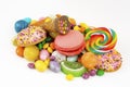 Colorful lollipops and different colored round candy. Top view Royalty Free Stock Photo