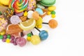 Colorful lollipops and different colored round candy. Top view Royalty Free Stock Photo