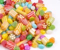 Colorful lollipops and different colored round candy. Top view Royalty Free Stock Photo