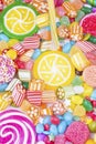 Colorful lollipops and different colored round candy. Top view Royalty Free Stock Photo