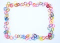 Colorful loom rubber bands frame on white backround Royalty Free Stock Photo