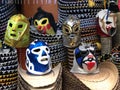 colorful Lucha Libre Mexican professional wrestling masks on sombreros