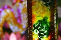 Colorful and luminous hand made lamp with flowers pattern Royalty Free Stock Photo