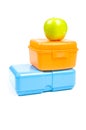Colorful lunchboxes with green apple Royalty Free Stock Photo