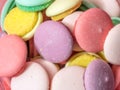 Colorful macaron cookies in glass bowl