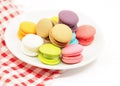 Colorful macaron cookies on white background, copy space. Royalty Free Stock Photo