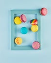 Colorful Macarons in Blue Frame Royalty Free Stock Photo