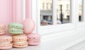 Colorful macarons in a cafe window display Royalty Free Stock Photo