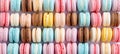 Colorful macarons cake with sweet macaroon minimal concepts pattern on food background