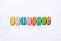 Colorful macarons cakes. Sweet french macaroons flying in motion
