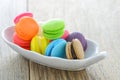 Colorful Macarons and coffee cup on wood table Royalty Free Stock Photo