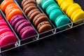 Colorful macarons cookies in the acrylic box Royalty Free Stock Photo