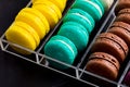 Colorful macarons cookies in the acrylic box Royalty Free Stock Photo