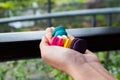 Colorful macarons on hand ,French Macaroons dessert