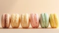 Colorful macarons in a row on a pastel background