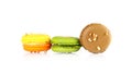 Colorful macarons on white backrgound