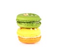 Colorful macarons on white backrgound