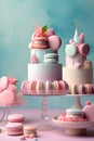 Colorful macaroon cakes on pastel pink background, selective focus